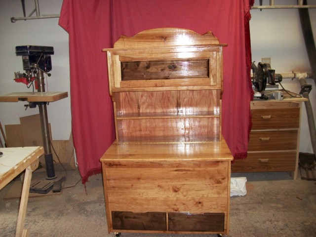 photo of toy box with the doors and drawers open