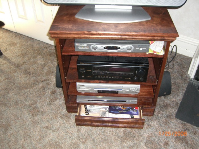 photo of cherry tv and sterrio cabinet