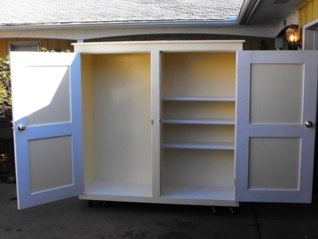 photo of a large tool storage cabinet with doors open